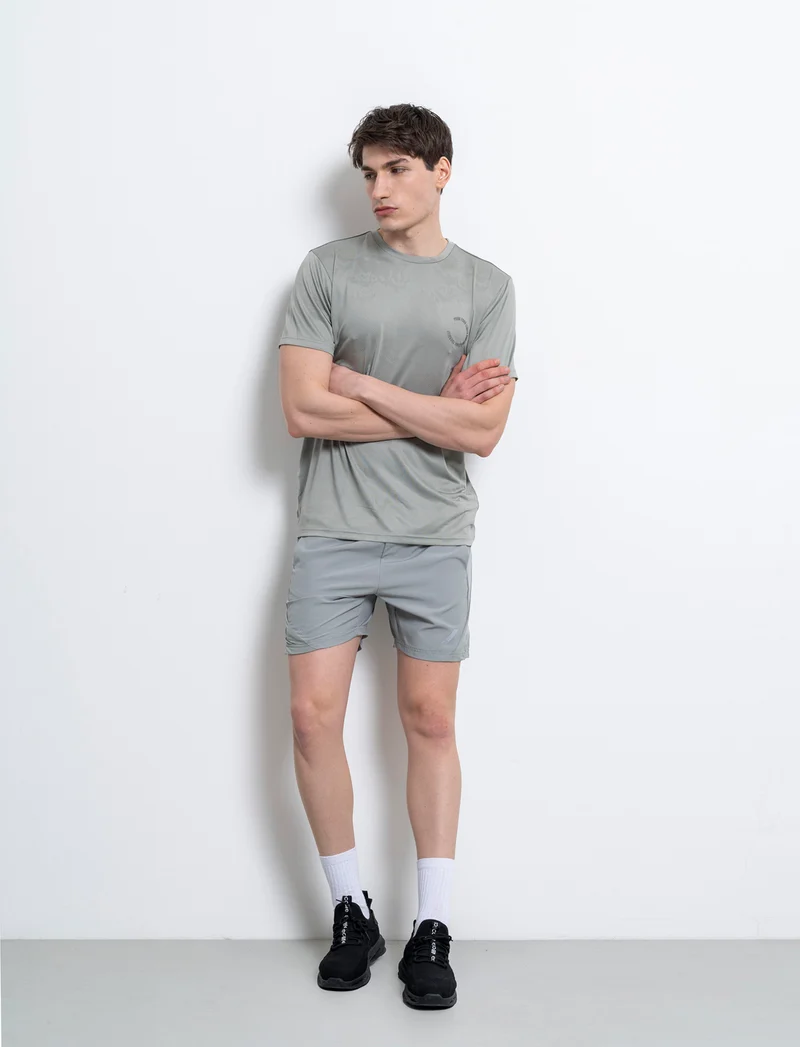 Shorts da allenamento in tessuto tecnico leggero da uomo - Verde