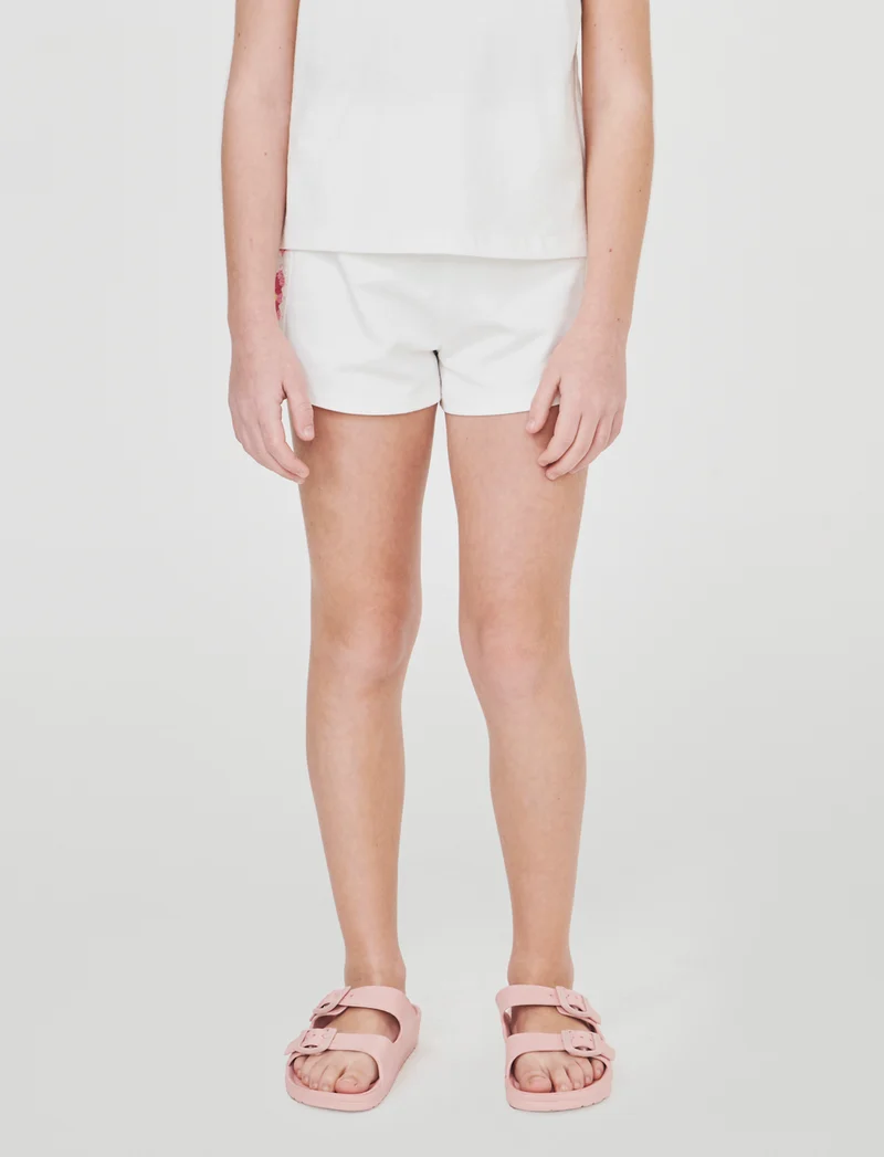 Pantaloncino con fasce in crochet e felpa - Bianco latte