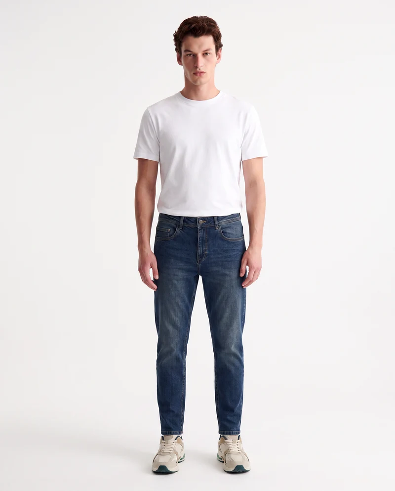 Jeans slim tapered fit blu medio effetto slavato - Denim