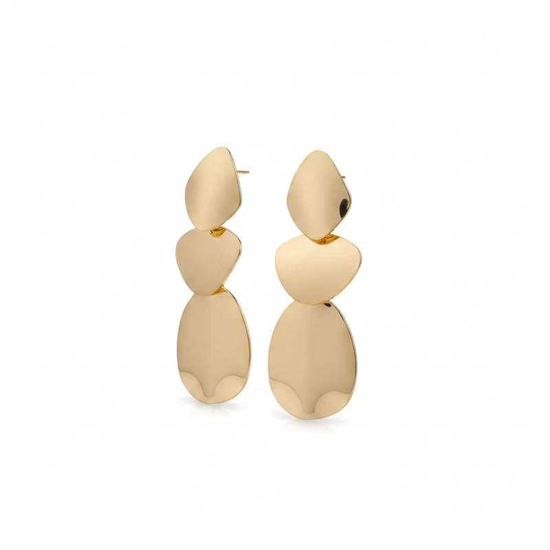 Orecchini pendenti con elementi geometrici irregolari e finitura lucida effetto oro. - Oro