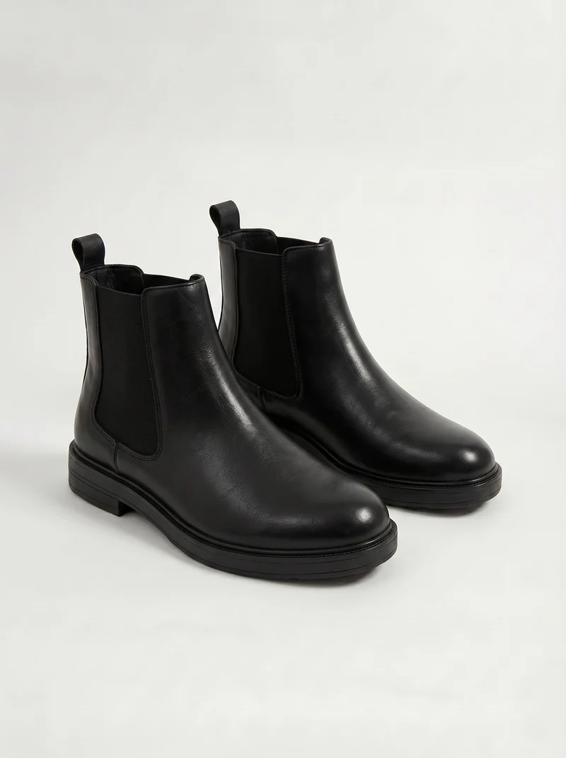 Stivale Chelsea nero in poliuretano con fasce - Nero