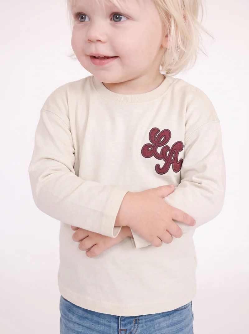 T-shirt in jersey con ricamo sportivo - Bianco latte