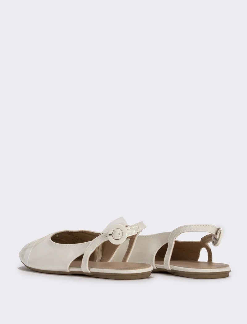 Slingback con fiocco in tulle da bambina. - Bianco panna