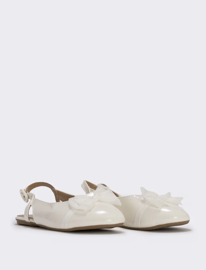 Slingback con fiocco in tulle da bambina. - Bianco panna