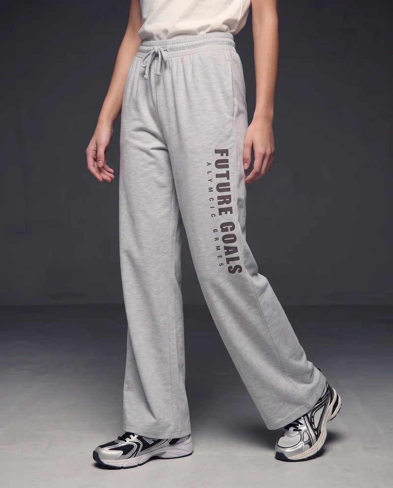 Pantaloni tuta dritti con coulisse e stampa - Grigio mel.