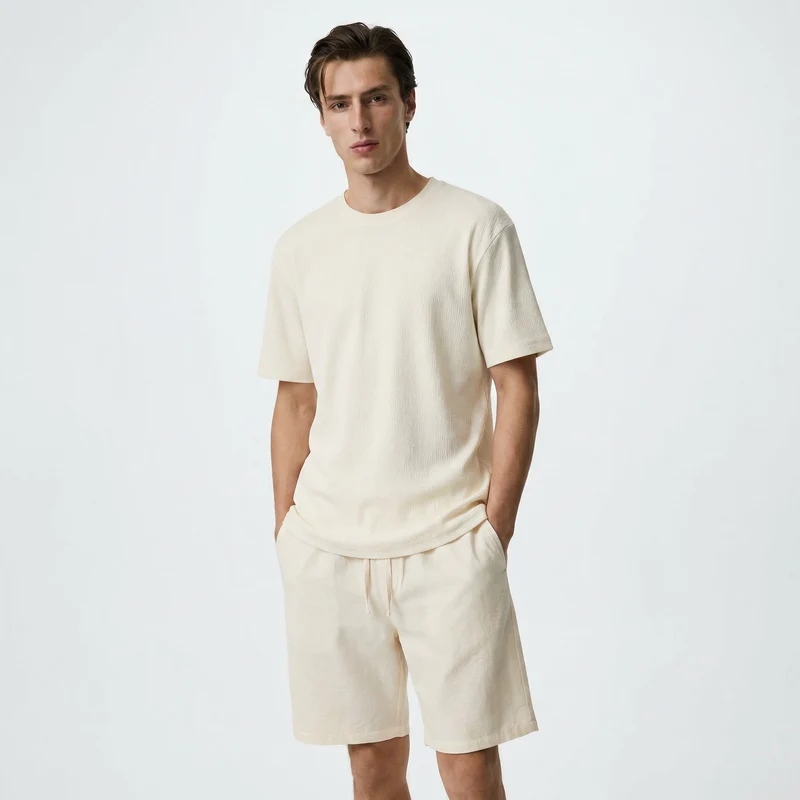 T-shirt girocollo in jacquard con maniche corte - Bianco sporco