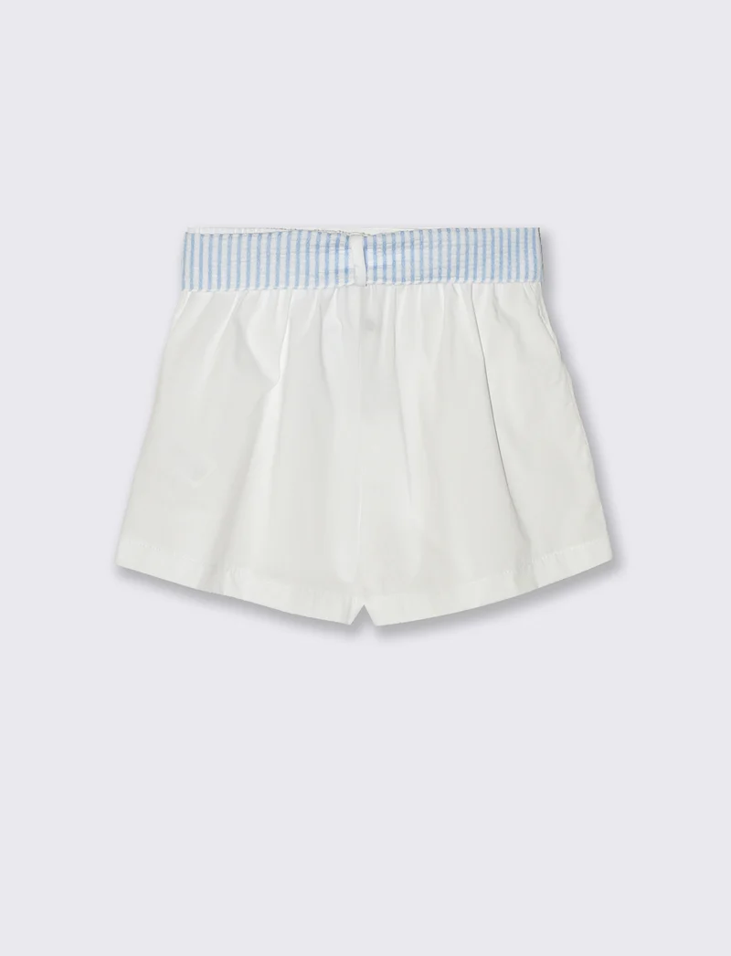 Short elastico da bambina con cintura in tessuto a contrasto. - Bianco