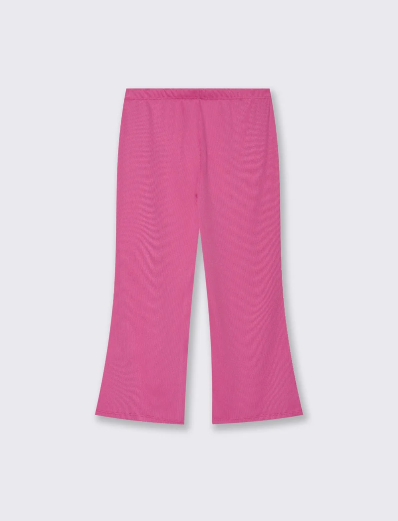 Leggings in costina modello flare. - Fuxia
