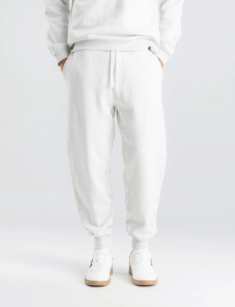 PANTALONI JOGGER IN FELPA CON STAMPA FLOCK - Grigio mel.