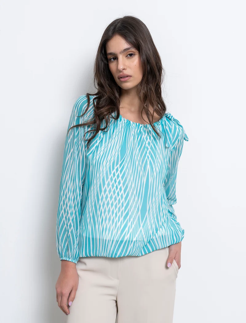 Blusa ampia in tessuto leggero con stampa e fiocco su una spalla. - Verde