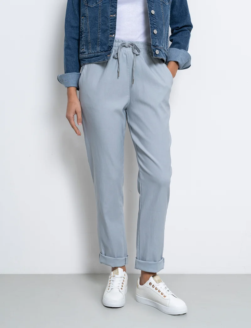 Pantalone in tessuto elasticizzato con coulisse in vita - Grigio