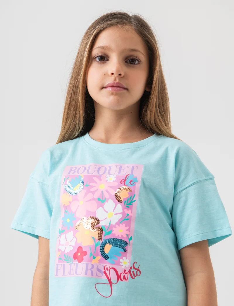 T-shirt mezza manica paillettes. da bambina - Verde acqua