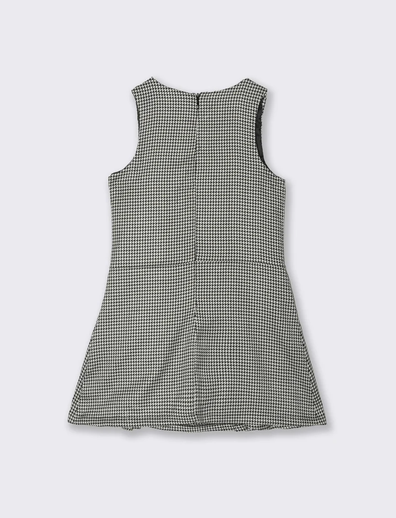 Abito smanicato elegante in pied de poule. - Fantasia
