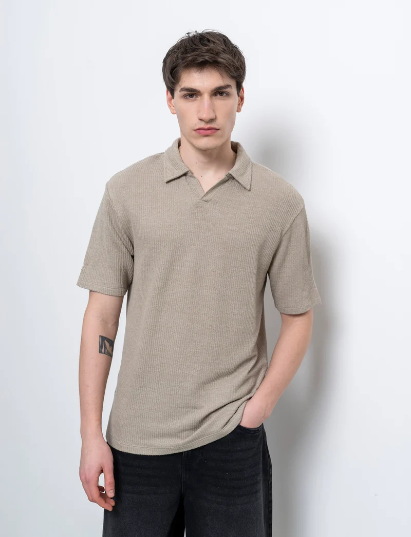 Polo con struttura a maglia da uomo - Verde salvia