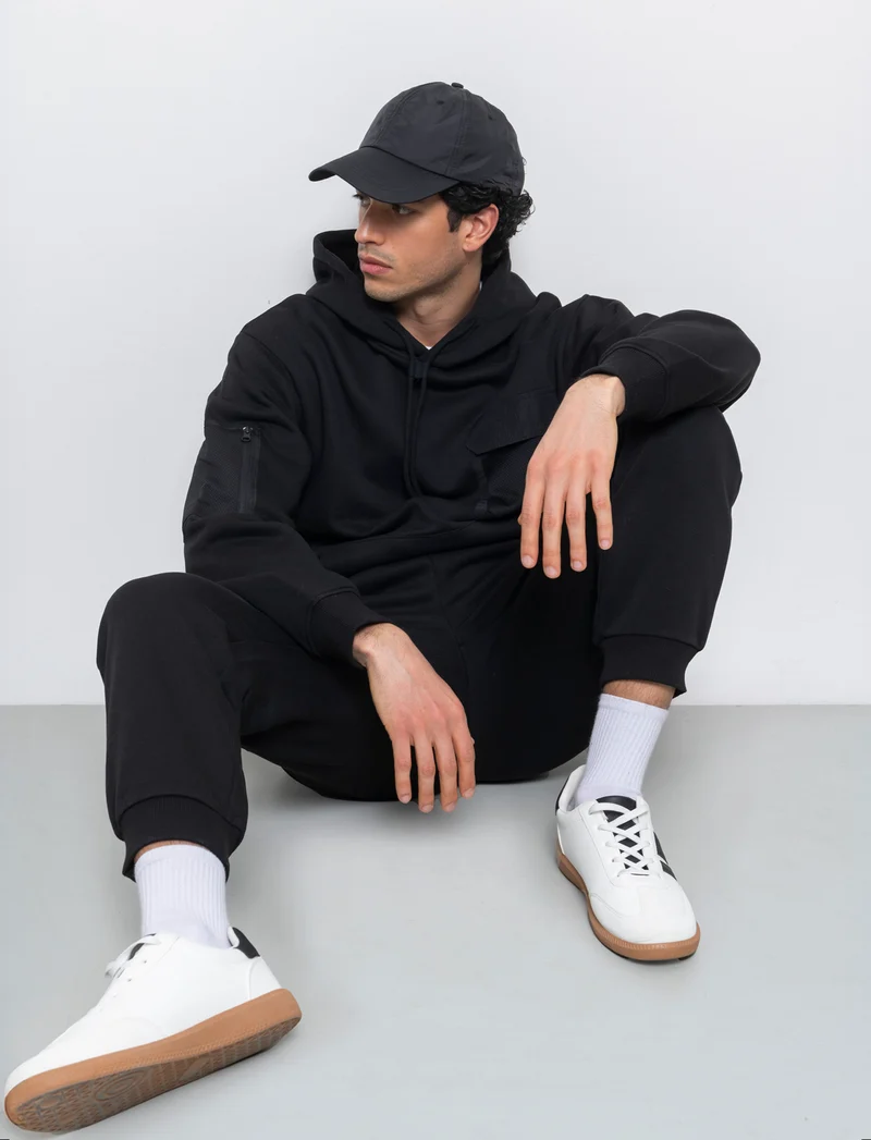 Pantaloni baggy fit in felpa con tasconi da uomo - Nero